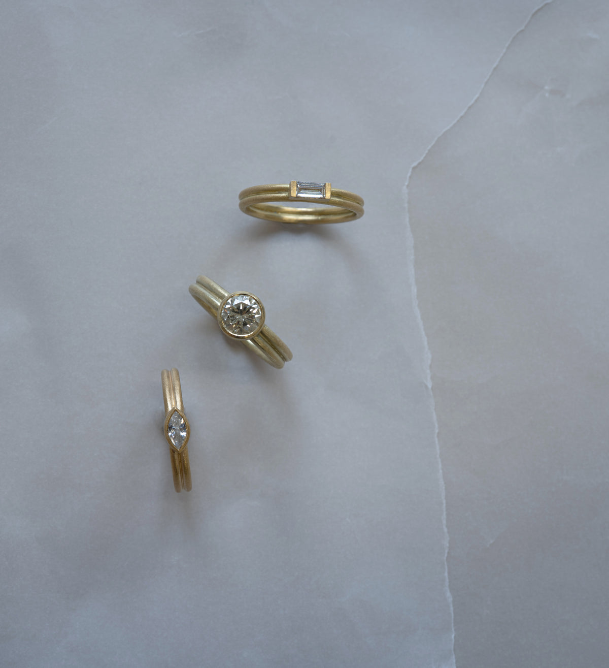 Double banded marquise solitaire