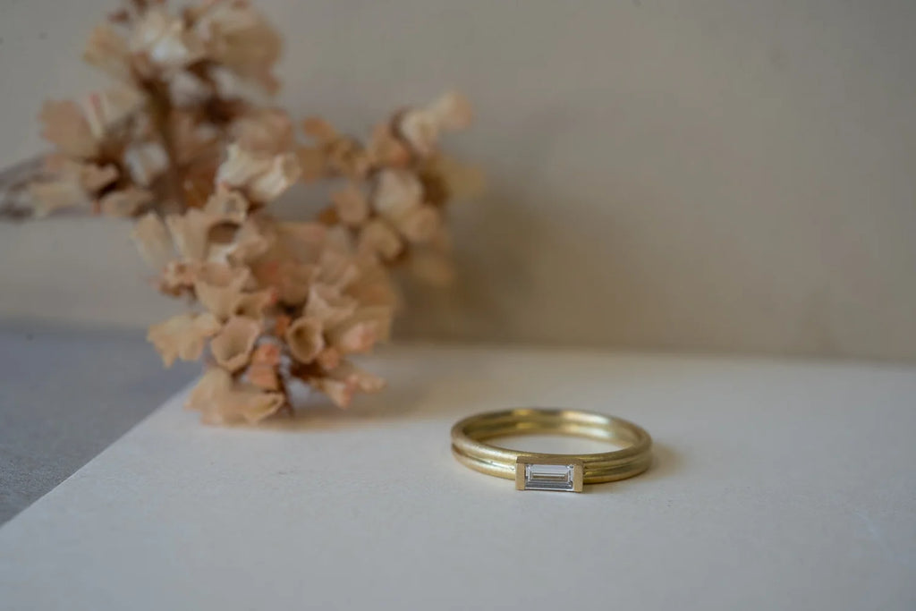 Double banded baguette solitaire