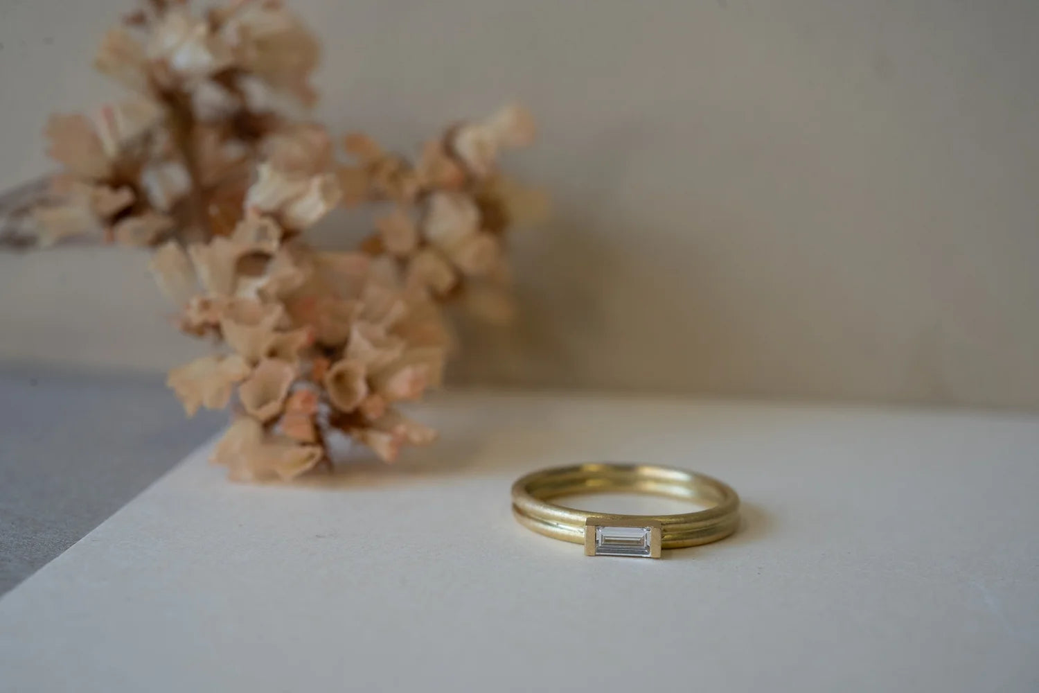 Double banded baguette solitaire