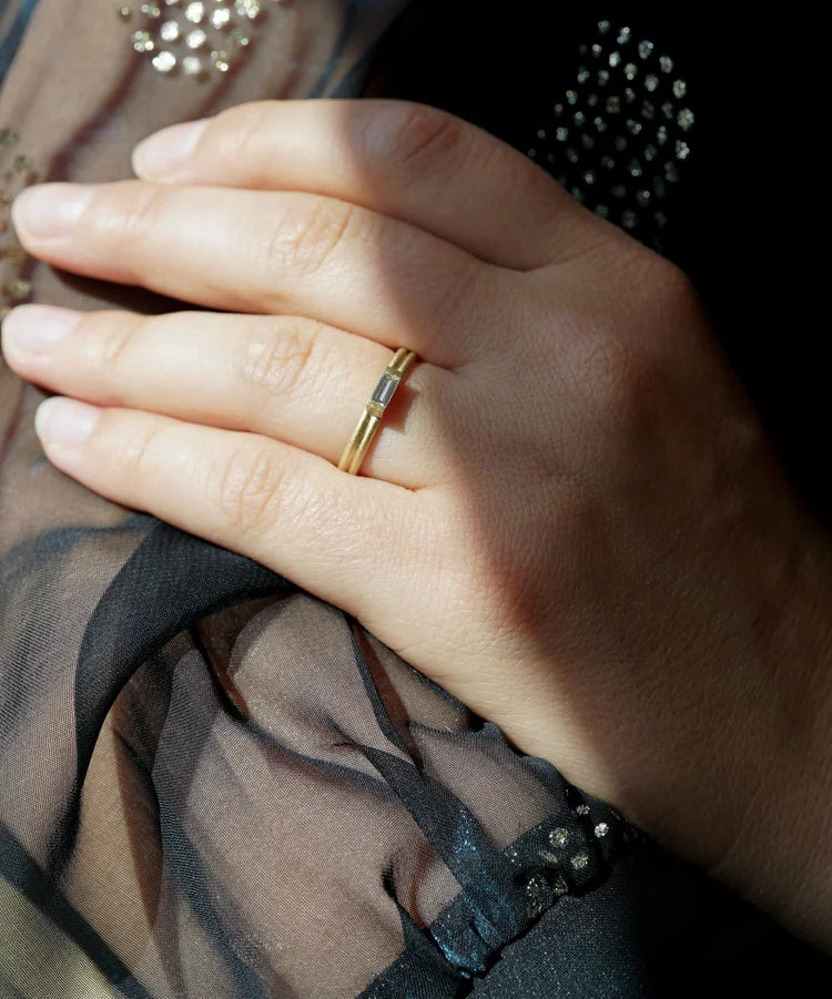 Double banded baguette solitaire