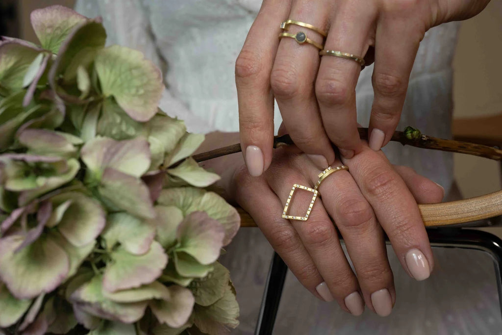Trapezium Ring - 18ct gold and diamond ring